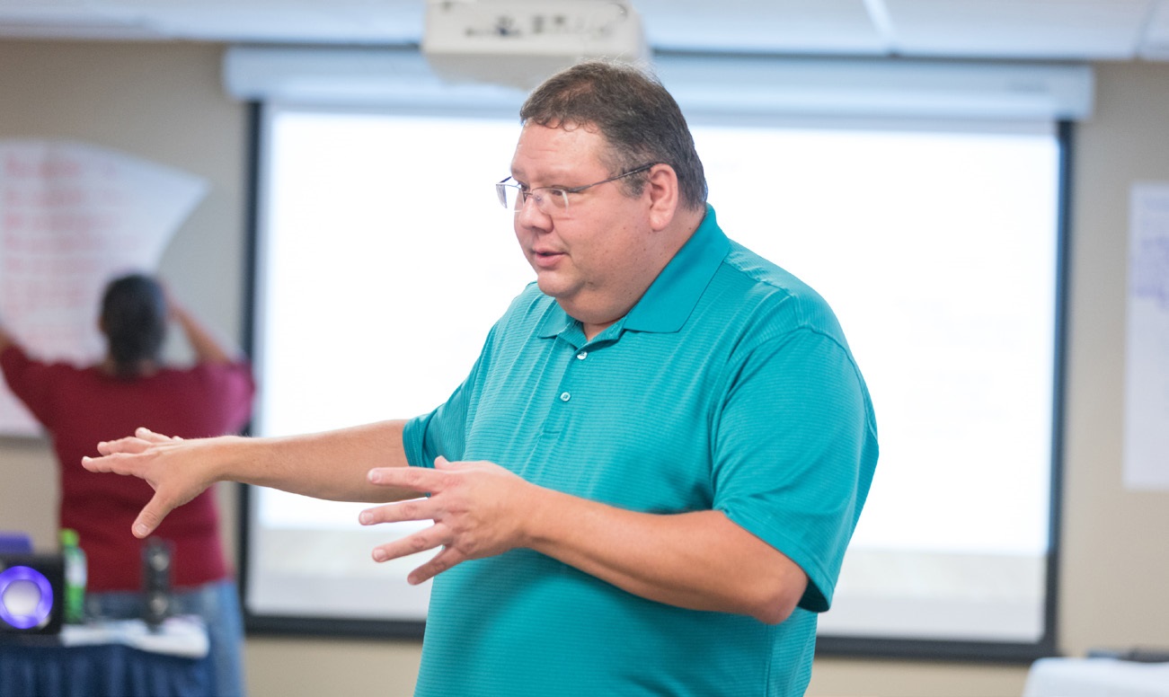 Training manager at a session