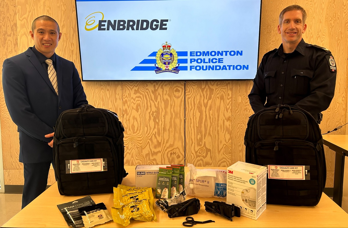 Two police officers with a medical kit
