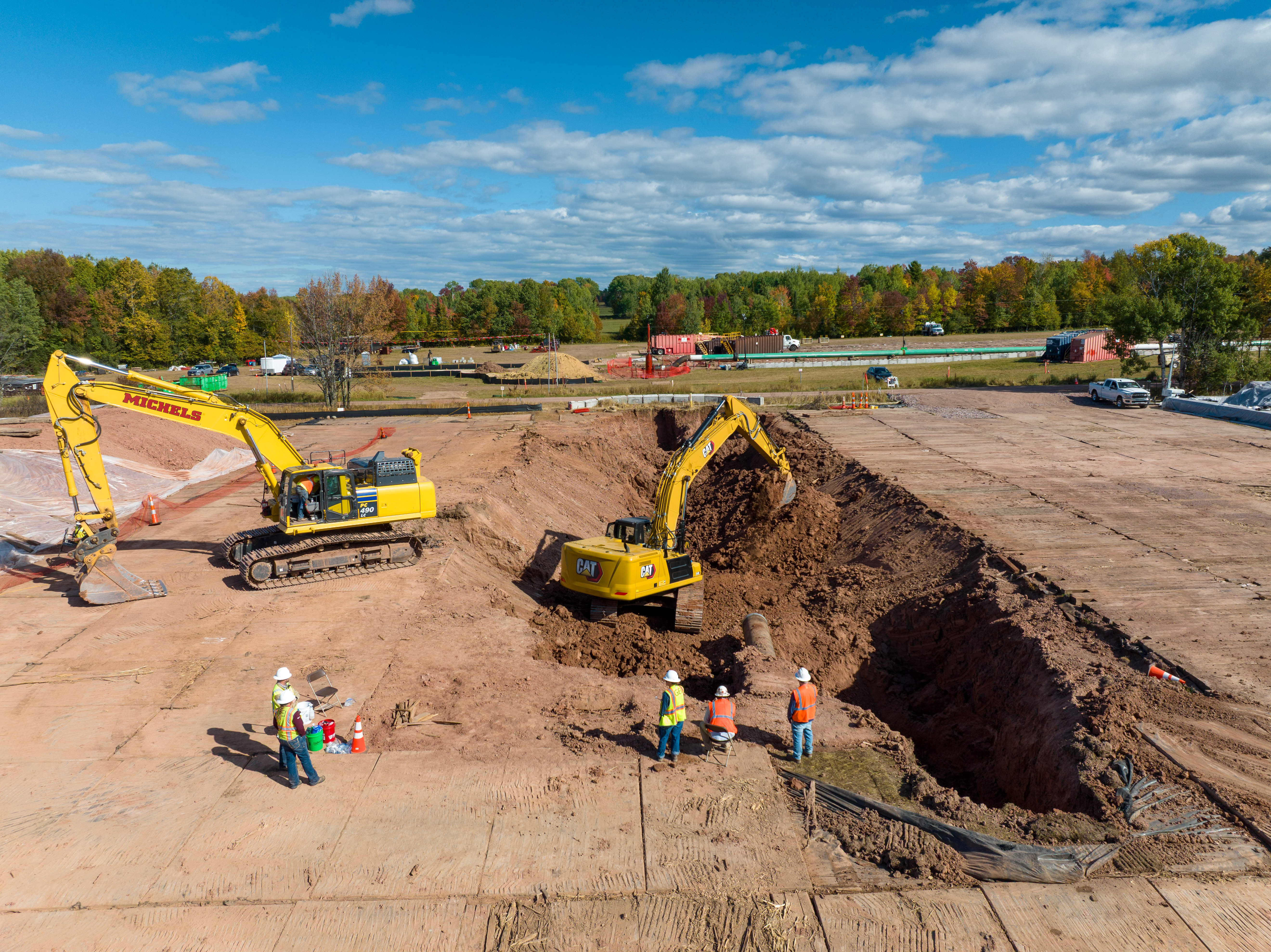 Workers on site with equipment 