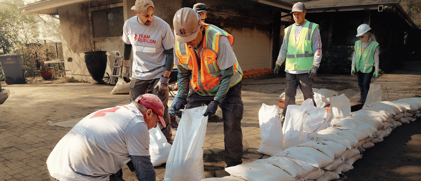 Safety workers filling sandbags